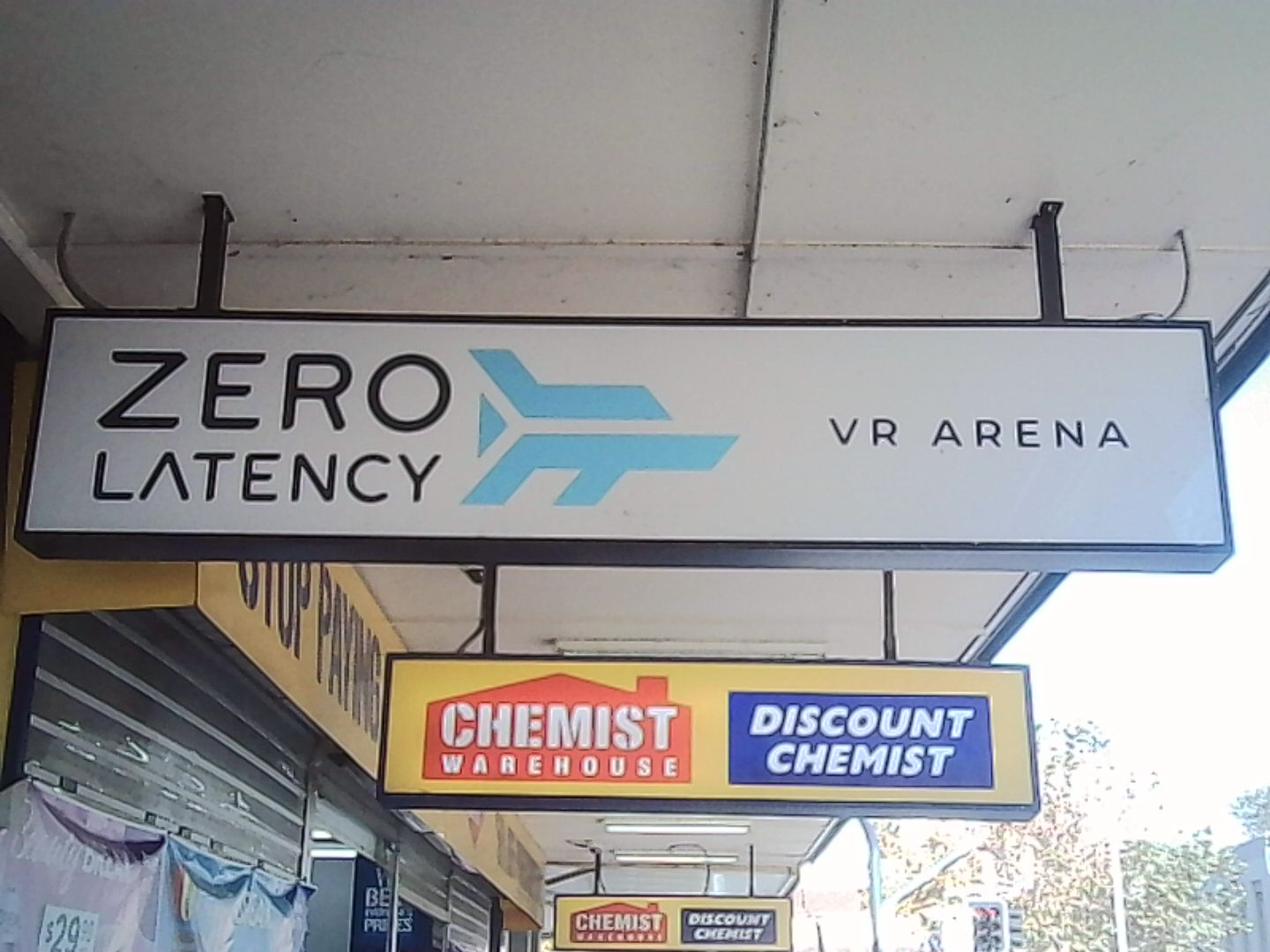Signage reading 'ZERO LATENCY VR ARENA'.
